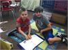 4th Graders enjoy reading poetry to their kindergarten friends. 